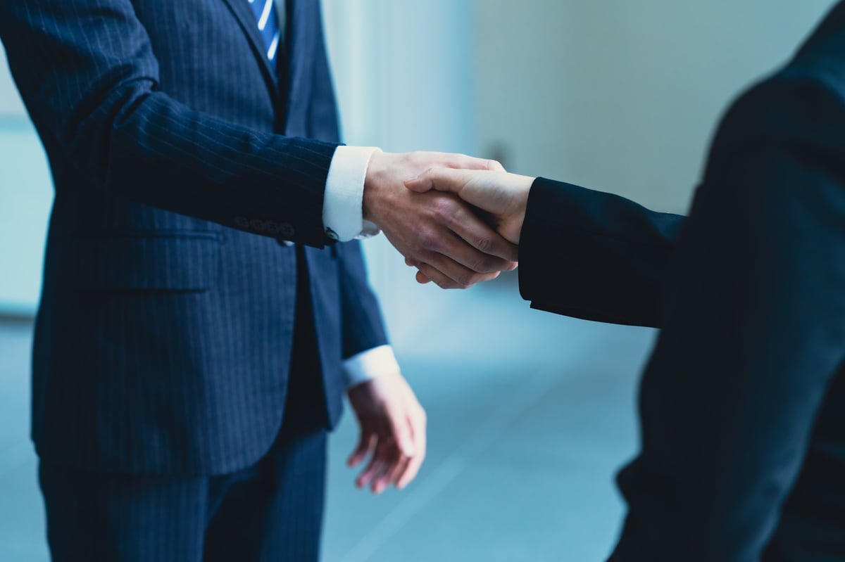 Business owners discussing loan options with financial advisor